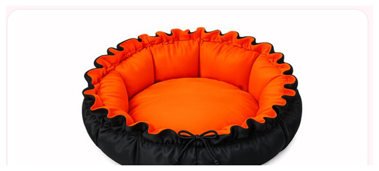 Pink Paw Round Bed in orange and black water-resistant fabric